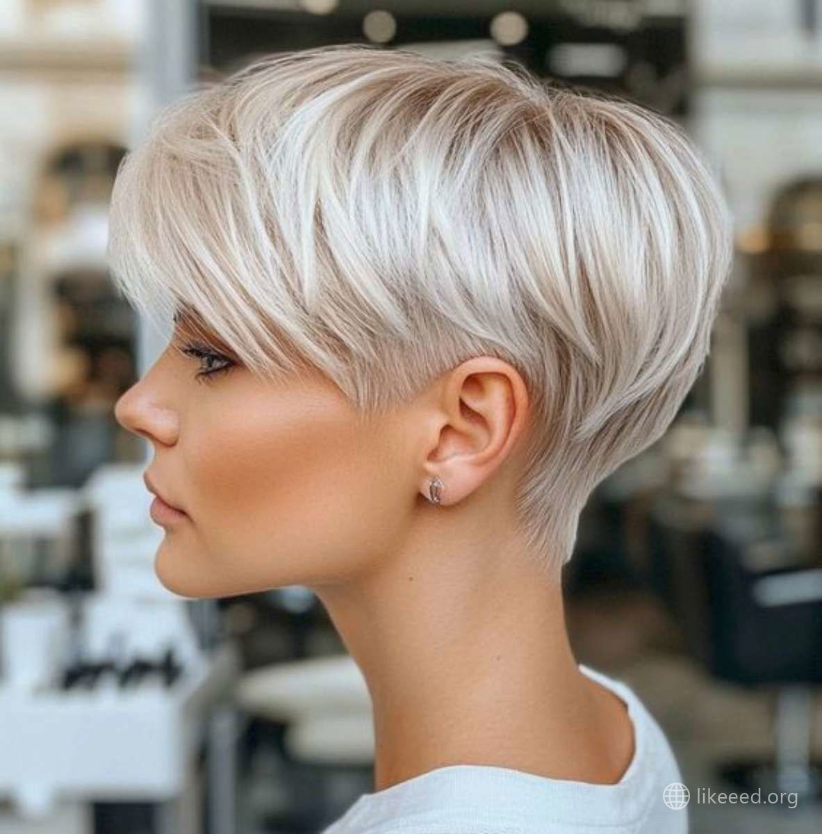 Layered Blonde Pixie with a Side Profile
